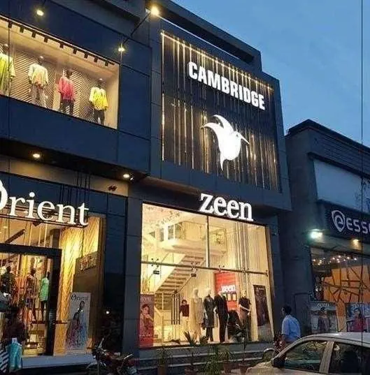 Completed retail storefront for a clothing brand at night